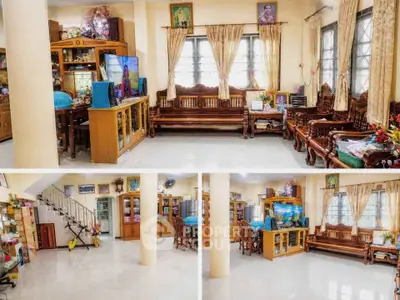 Spacious living room with elegant wooden furniture and large windows, perfect for family gatherings.