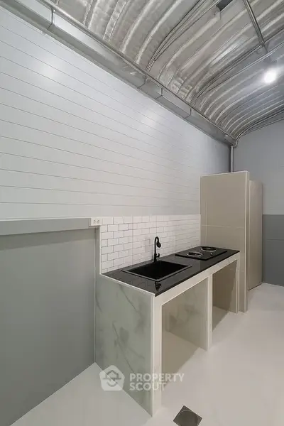 Modern minimalist kitchen with sleek design and open layout