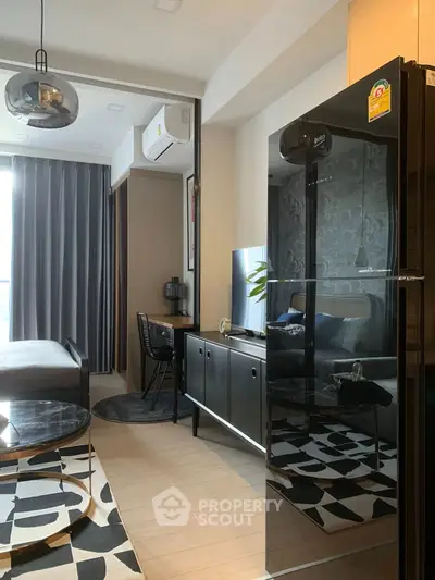 Modern living room with stylish decor and sleek furniture in a contemporary apartment.