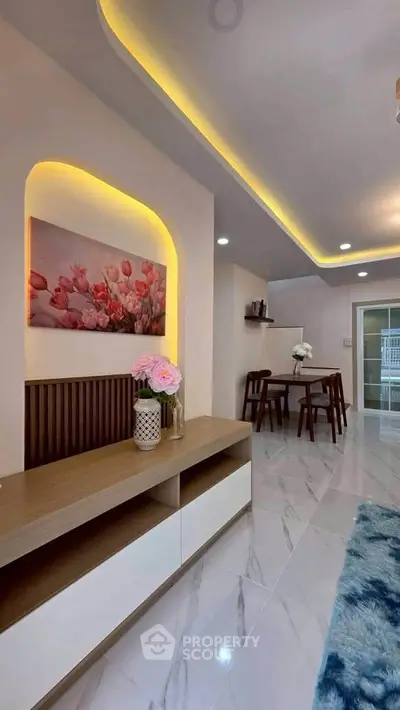 Modern living room with elegant dining area and stylish decor