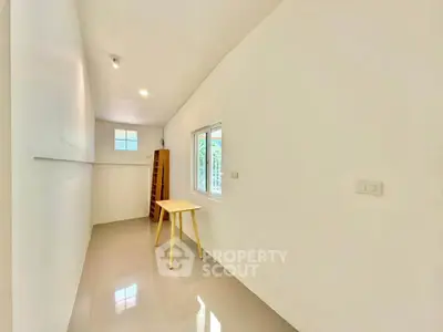 Minimalist study room with natural light and sleek flooring