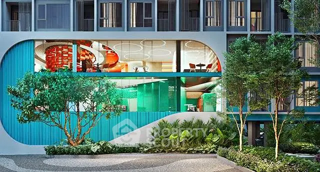 Modern building exterior with vibrant colors and lush landscaping, showcasing unique architectural design.