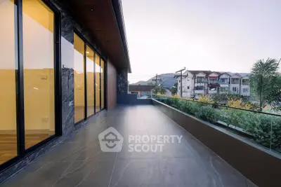 Spacious balcony with scenic view in modern residential building