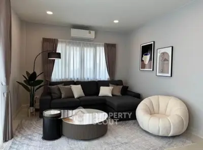 Modern living room with stylish furniture and elegant decor