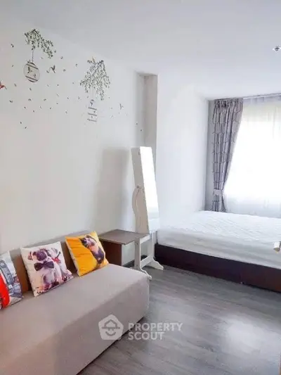 Modern studio apartment with cozy decor and natural light