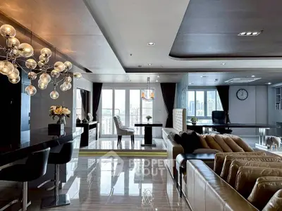 Luxurious modern living room with city view, elegant lighting, and stylish furnishings.