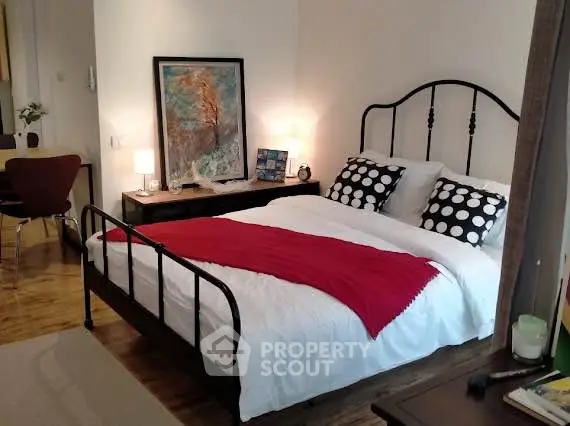 Cozy bedroom with stylish decor and modern furnishings