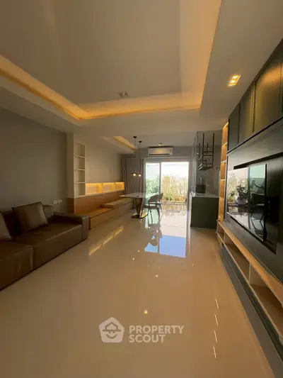 Spacious modern living room with sleek design and natural light