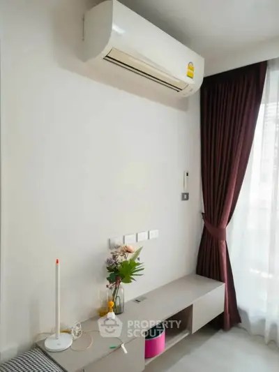 Modern living room with air conditioning and elegant decor