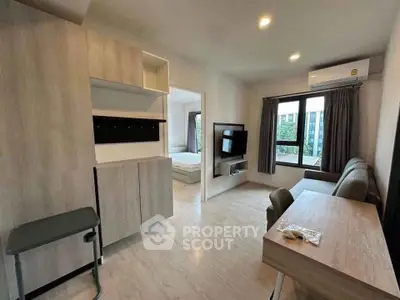 Modern apartment interior with open living area and natural light