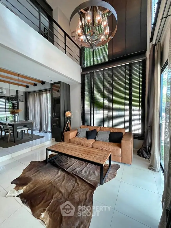 Luxurious modern living room with high ceilings and stylish decor