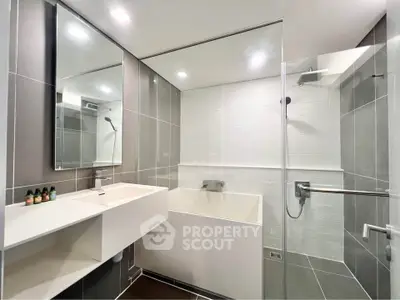 Modern bathroom with sleek design and spacious shower area