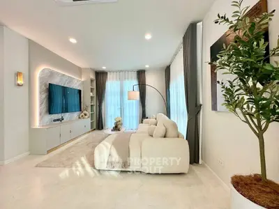 Luxurious modern living room with elegant decor and large TV