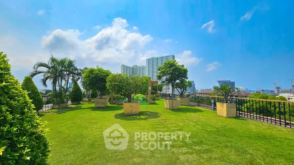 Stunning rooftop garden with lush greenery and city skyline views