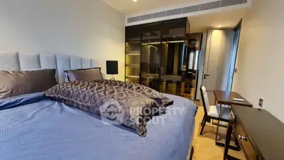 Luxurious bedroom with elegant decor and spacious walk-in closet