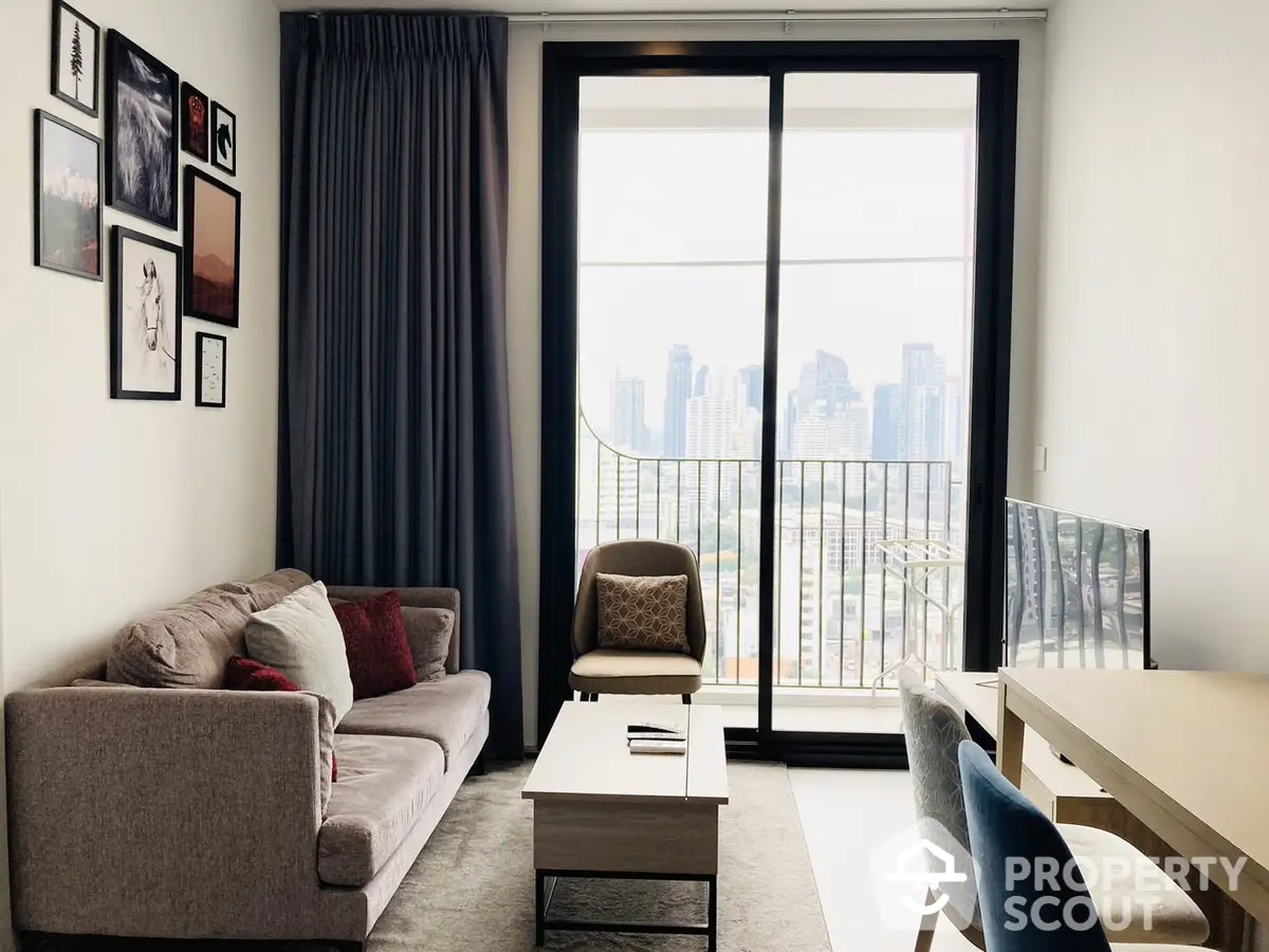 Chic urban living room with plush seating and a captivating city skyline view through floor-to-ceiling glass doors leading to a balcony.