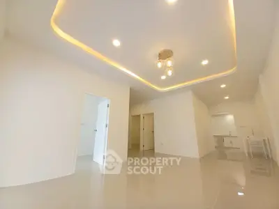 Spacious modern interior with elegant lighting and glossy flooring