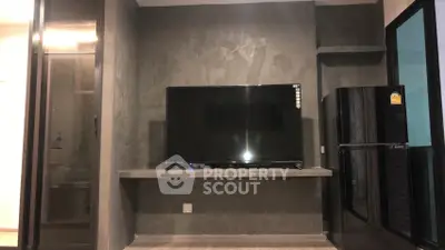 Modern living room with sleek TV setup and stylish decor