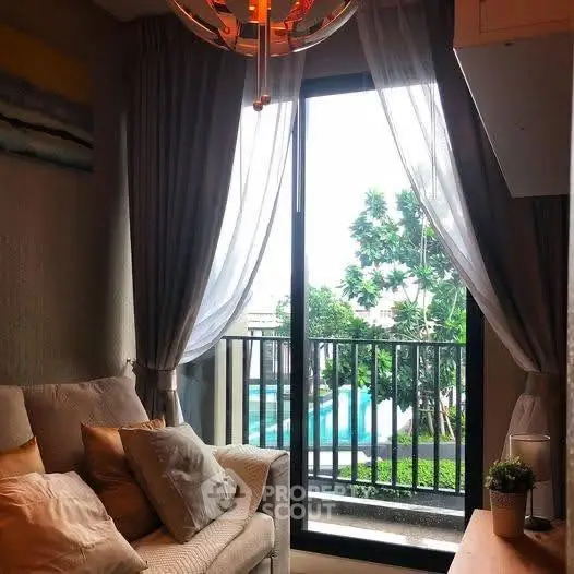Cozy living room with balcony view and elegant decor