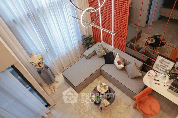 Modern living room with stylish decor and large windows