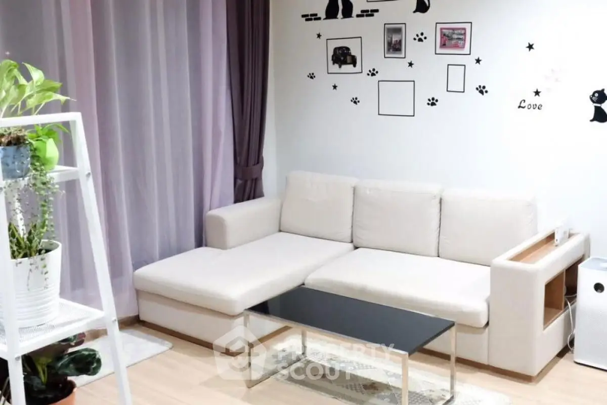 Cozy living room with modern white sofa and stylish decor