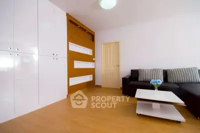 Spacious modern living room with sleek design and stylish furniture