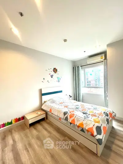 Bright and cozy bedroom with modern decor and large window view