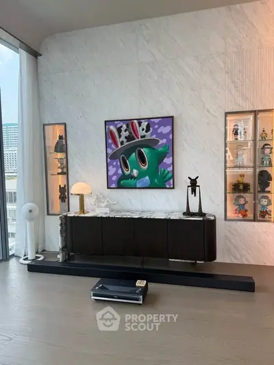 Modern living room with stylish decor and large window view