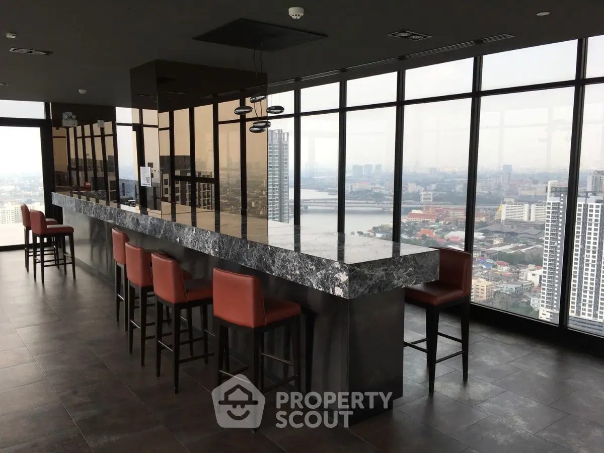 Luxurious rooftop bar with panoramic city views and modern seating
