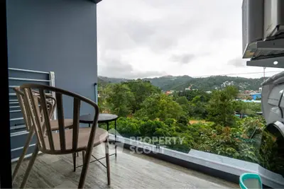Charming balcony with scenic mountain view, perfect for relaxation and enjoying nature.