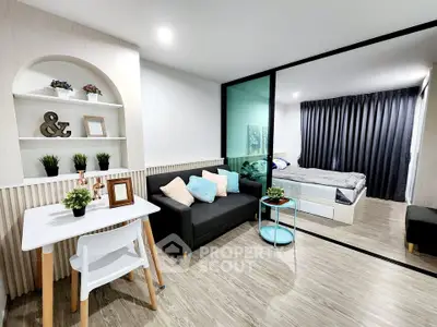 Modern studio apartment with stylish decor and cozy living area