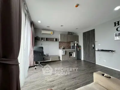 Modern studio apartment with open kitchen and stylish decor