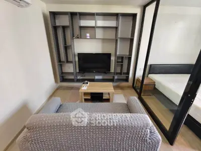 Modern living room with stylish shelving and cozy seating area
