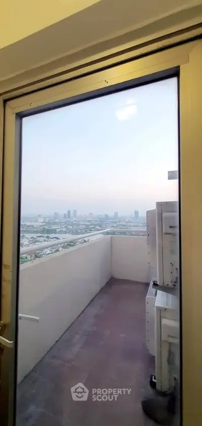 Stunning cityscape view from a high-rise balcony, perfect for urban living enthusiasts.