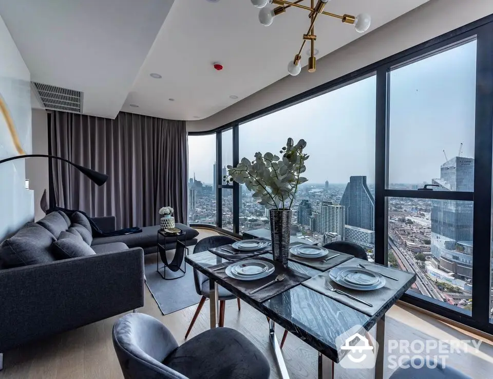 Stunning high-rise apartment with panoramic city views and modern interior design.