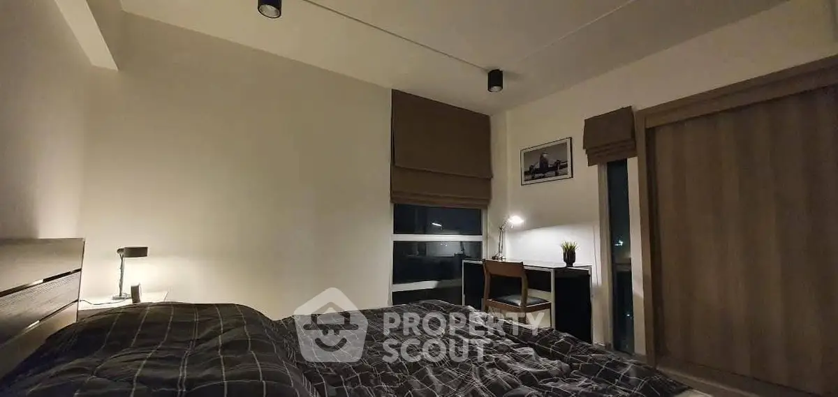 Cozy modern bedroom with stylish decor and ambient lighting