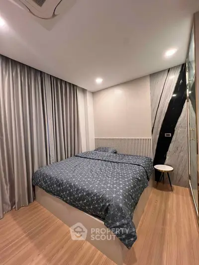 Modern bedroom with stylish decor and cozy ambiance