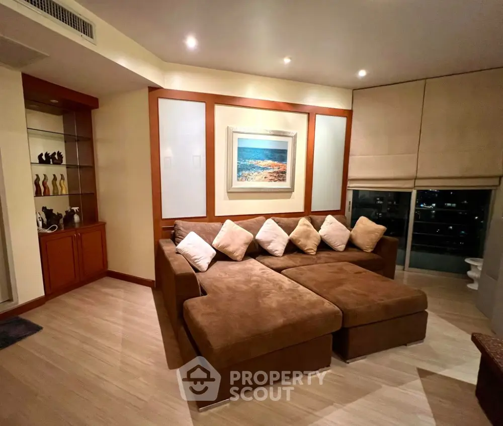 Luxurious living room with elegant decor and cozy seating in modern apartment.