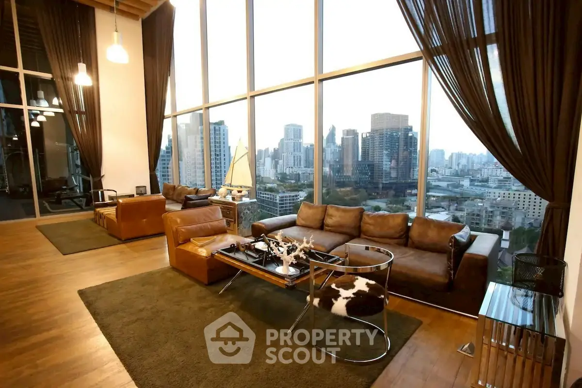 Luxurious high-rise living room with stunning city view and elegant decor