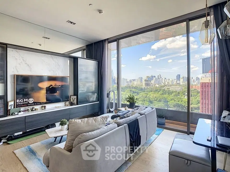 Luxurious living room with stunning city skyline view through floor-to-ceiling windows.