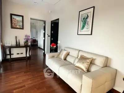 Elegant living room with hardwood floors and stylish decor
