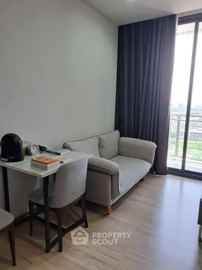 Cozy living room with modern decor and balcony view