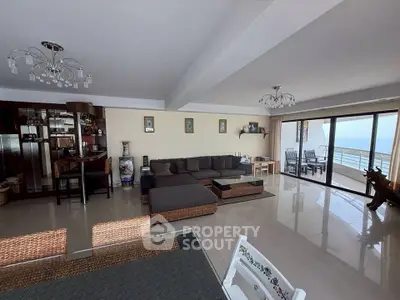 Spacious living room with ocean view and elegant decor