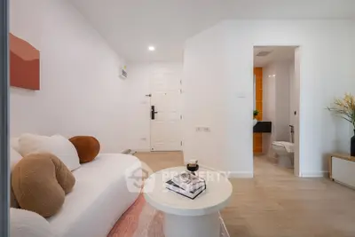 Modern living room with cozy sofa and stylish decor