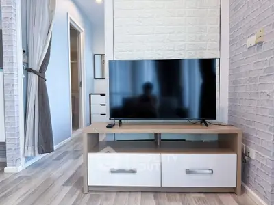 Modern living room with sleek TV stand and stylish decor