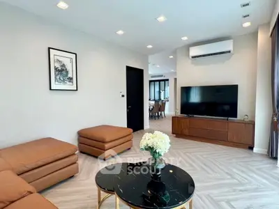 Spacious modern living room with elegant decor and open layout