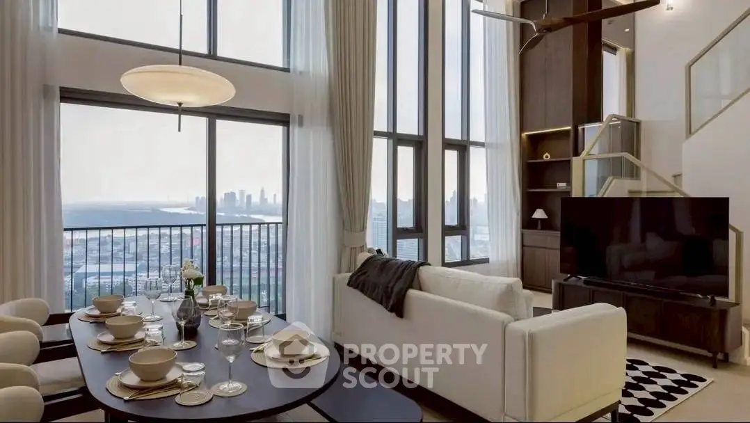 Luxurious living room with stunning city view, high ceilings, and elegant dining area in modern apartment.
