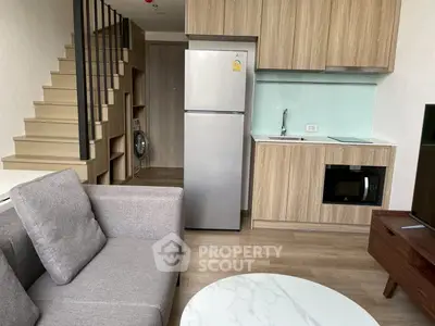Modern loft apartment with stylish kitchen and cozy living area