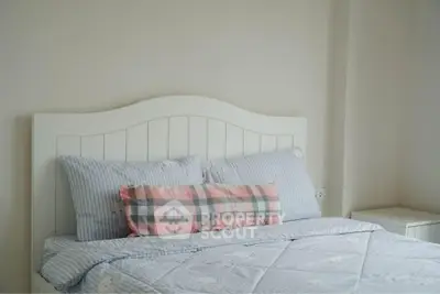 Cozy bedroom with stylish bedding and elegant headboard