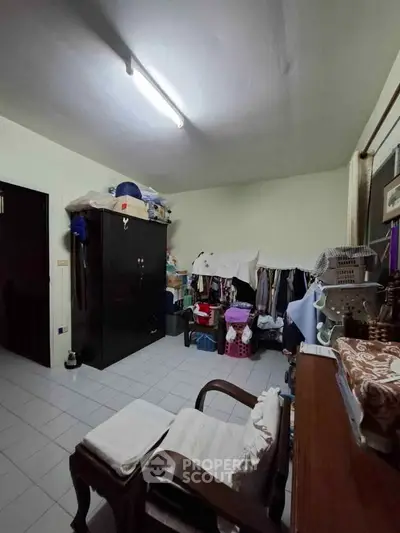 Cozy storage room with ample shelving and organized layout, perfect for maximizing space in your home.